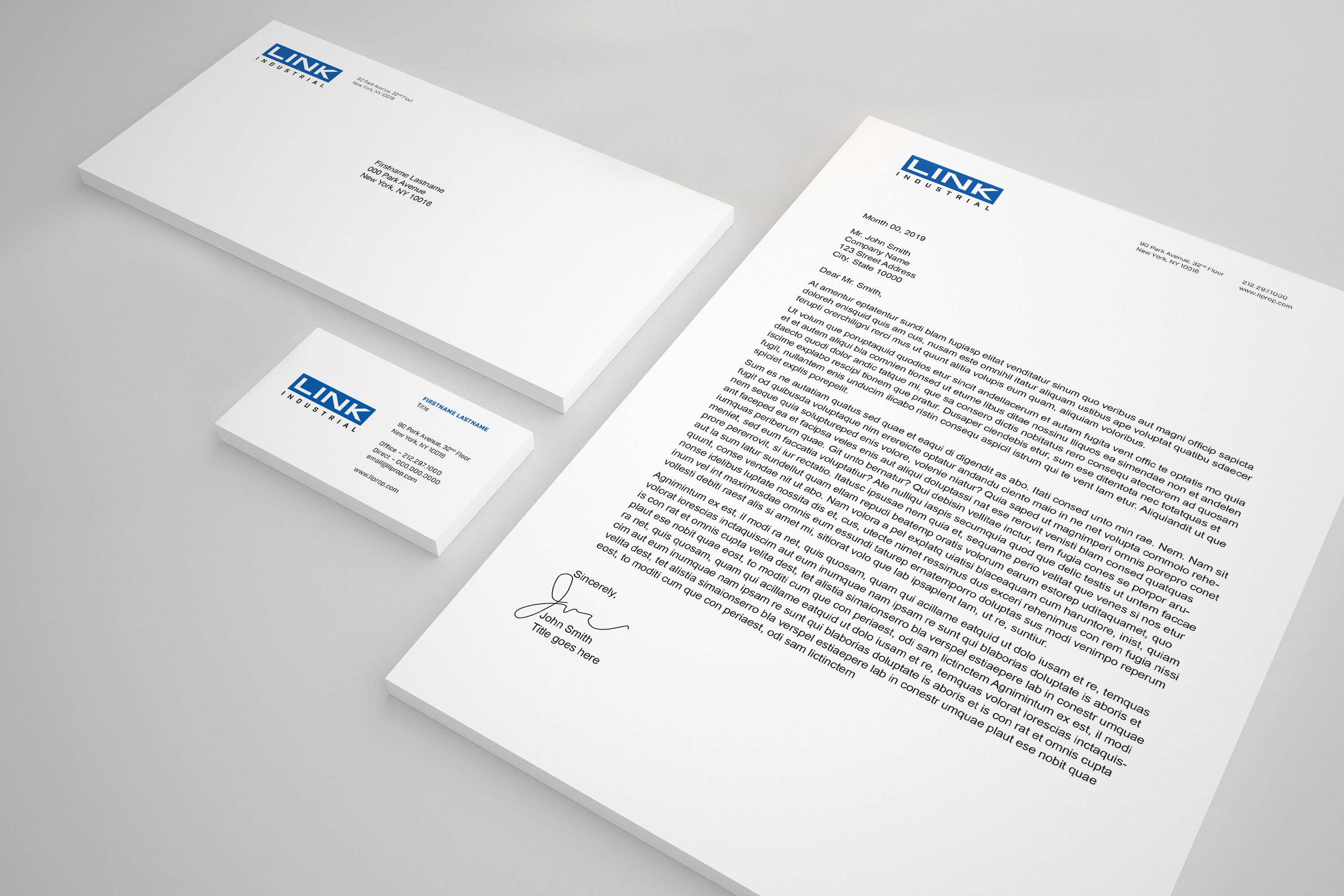 Stationary suite showing letterhead, envelope and business card